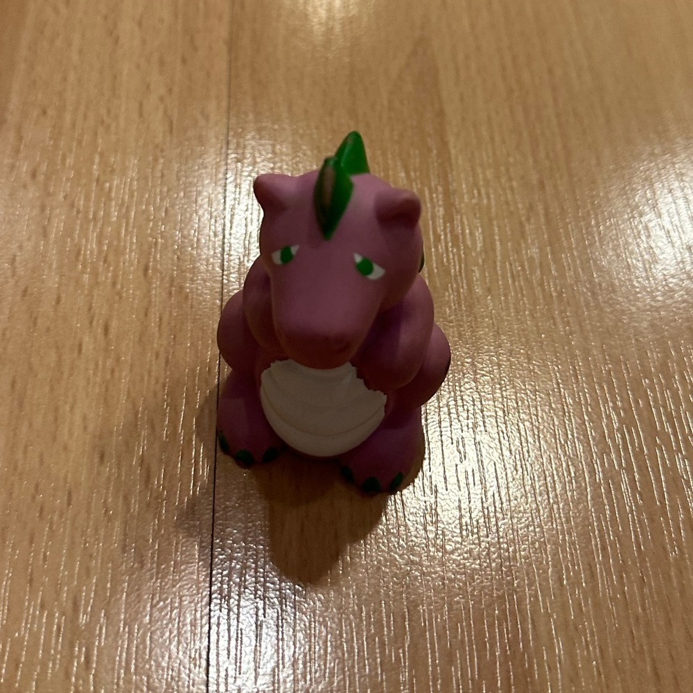 Purple Dinosaur Toy with Green Accents